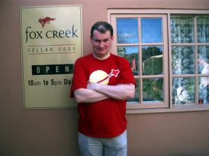 Me at a Cellar Door. I appear to be frowning, but it's just the sun in my eyes